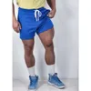 Les shorts de créateurs se vendent bien.Nouveau Pantalon pour hommes été recadrée élastique tissé