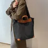 Borse di tela semplici Borse da donna nuove borse casual dal design morbido Borsa a tracolla da viaggio Borse per la spesa Borsa da scuola per ragazze YFA2190