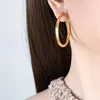 Boucles d'oreilles créoles pour femmes, vente de motifs de vagues exquis personnalisés européens et américains, tempérament à la mode, fil torsadé pour femmes