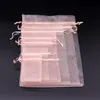 100pcs Sacs d'organza Sacs-cadeaux en organza transparent avec des bijoux de cordon favori