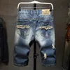 2024 Zomerheren scheurden korte jeans streetwear Big Hole mode vintage blauw slanke denim shorts merk kleding 240422
