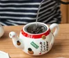 Thee -sets creatieve schattige gelukkige katten porseleinen theeset cartoon keramische theekopje pot met zeef mooie plutus cat theepot mug teaware