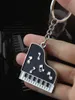 Keychains Grand Piano Keychain Black And White Keyboard Keyring Music Jewelry