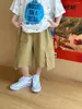 ズボンの夏の服の男の子ハンサムパーソナリティオールマッチショーツ2024韓国スタイルの子供服ゆるいカジュアルカーゴ
