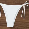 Bikini de maillots de bain féminin ensemble sexy blanc creux de Micro Women 2024 Mini Thong Swimsuits Pearl Decoration String Halter Bather
