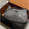 Totes Luxury Hands Hands Tote Sac Womens Handbag Designer Sacs Mini Tote Sac épaule joli triangle en cuir transportant un petit banquet de maquillage.