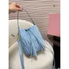 denim designer tas miuimiui Instagram trendy crossbody tas western geplooide zachte onderarm tas water emmertas kwastje schouder crossbody tas vrouwen