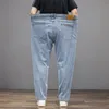 超プラスサイズストレッチメンズビジネスジーンズシンプルなルーズワイドレッグストレートパンツ