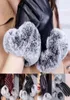 Vinterkvinnor berör skärm eleganta mjuka svarta läderhandskar varma päls mittens3908896