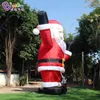 12mH (40ft) with blower arrival advertising inflatable standing Santa Claus carrying bag inflation cartoon figure for Christmas party event decoration toys sport