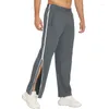 Pantalon masculin masculin piste de taille élastique zipant un pantalon de pantalon décontracté athlétique joggers de la jambe large avec des poches