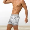 Underbyxor män avslappnad boxare underkläder med ben slitsar fast färg elastiska midjeband shorts lös passform tunna släta satin hem trosor