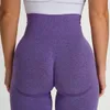 Pantalones de yoga sin hilos incómodos de elevación de la cadera pantalones cortos apretados de gimnasio