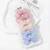 Haarzubehör 6pcs/Set Mini Haarbögen Clip für Mädchen frische Feste Farbbogenknoten Haarnadeln süße Kinder Boutique handgefertigtes Haar Clips Accessoires