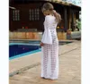 2024 Robe de plage antisun d'été pour femmes Biqunis Cover ups Voir à travers la jupe de natation latérale Sarong Bohemian Bikini 240420