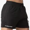 Shorts maschile uomini sport sport estivi da spiaggia tasca con zip bodybuildingpants jogger fitness che correva palestre