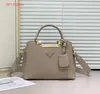 Trójkąt mody pod pachami Crescent Moon Bag luksus skórzany krzyżowy body 10a designerskie torby losowe pradhandbag dhgate dzieci