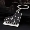 Keychains Grand Piano Keychain Black And White Keyboard Keyring Music Jewelry