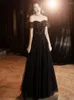 Robes décontractées noire essuyage robe coffre de femme de couleur de couleur de femme d'épiscins d'épissure élégant en jupe de mode longue élégante robe de soirée de mode M393