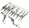 Hele 50pcSlot Game Gun Model Key Chain Metal Alloy Key Rings Koets Holders Maat 6 cm Blister Card Pakket Key Chains2543387