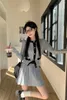 Robes de travail coréenne Girl College Style Suit en tricot Femme Femme Office Offise Cardigan Pleas Mini Jupe Deux pièces Fashion Femme Vêtements