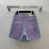 Brand Shorts Designer Pants Kobiety Sprężyn Spring Women Fashion Logo Dżinsy spodnie dżinsowe talia i szerokie nogi Jean 26 marca