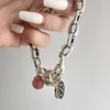 Bracelets de liaison 2024 bracelet féminin imbriqué de fraises de fraise à la fraise à bascule Colliers Cercle lié mixte pour femmes