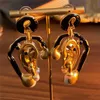 Personnalité Boucles d'oreilles de goujon pour les diables du nez pour femmes pour femmes bijoux en laiton rétro heavy metal Europe et Amérique 240417