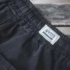 Pantalon masculin Maden Legging Black Automne décontracté et hiver de neuf points Sallonnes à cou de couches multi-poches Cargo de mode