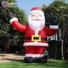 12mH (40ft) with blower arrival advertising inflatable standing Santa Claus carrying bag inflation cartoon figure for Christmas party event decoration toys sport