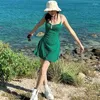 カジュアルドレスグリーンポルカドットミニドレススパゲッティストラップバックレスセクシービーチ女性ファッション自由hoho夏2024年