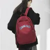 Sac à dos minoritaire conception de couleur solide sac dessin animé étudiant sac à dos adolescent sac à école petit badge imperméable femme mignonne