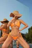 Kobiet w kąpieli kąpielowej Seksowna łańcuch połączona stringi bikini 2024 Kobiety naciśnij mikro kąpiel brazylijski kostium kąpieli krawat krawat biquini luksus