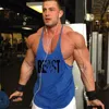 Baumwoll -Fitnessstudios Tanktops Männer ärmellose Tanktops für Jungen Bodybuilding Kleidung Unterhemd Fitness Stringer Weste 240429