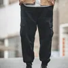 Pantalon masculin Maden Legging Black Automne décontracté et hiver de neuf points Sallonnes à cou de couches multi-poches Cargo de mode