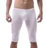 Calzoncillos hombres ropa interior leggings de seda la elasticidad apretada bolsa translúcida de forma sexy entrenamiento deportivo delgado pantalones boxeadores largos