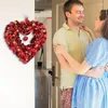 Dekorativa blommor Hjärtformad blomma krans Valentins krans för ytterdörrförslag Bekännelse heminredning Festival firande bröllop