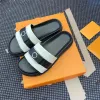 Designer sandaler män kvinnor tofflor trycker botten blommor tofflor äkta läder låga klackar gummi män glider bländande blommor plattform reglage loafers