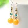 Boucles d'oreilles en peluche enracinées turquoise jaune de cire d'abeilles longues de style chinois