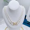 Collier de créateur de mode de luxe 20Style pour femmes Colliers de perles juifs Chaîne Retro Elegance Pendant Colliers de mariage Colliers de mariage