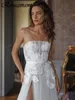 Élégants robes de mariée sans bretelles à grande part en ligne A-Line Appliques sans manches