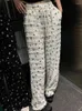 Pantalon de femme coréen chic de l'arc chic imprimé les jambes larges femmes en dentelle lâche épissé haute taille pantalon mince streetwear décontracté pantalon