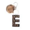 Fashion Leopard 26 Lettere Tornario Purry Pom Pom Ball pendenti per portachiavi per auto Accessori PU Leather Leather Cowboy Style Keyring