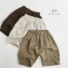 ズボンの子供衣類綿リネンハンサムクールなカジュアルカーゴショーツ2024夏の男の子の女の子韓国のソリッドカラールーズシンプルパンツ