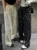 Pantalon de femme coréen chic de l'arc chic imprimé les jambes larges femmes en dentelle lâche épissé haute taille pantalon mince streetwear décontracté pantalon
