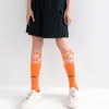 Chaussettes pour femmes Bandage réfléchissant fluorescent Relat Harajuku LETTRES IMPRIMÉ HIP HOP HOTE HOSIERY LUMINÉE