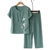Pantalon de deux pièces pour femmes Pyjama Top élégant Ensemble d'âge moyen avec des fleurs à manches courtes à manches larges à manches larges confortables pour la mère