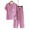 Pantalon de deux pièces pour femmes Pyjama Femmes Élégant Moyen d'âge avec des fleurs à manches courtes à manches courtes à manches larges confortables pour la mère