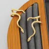 Projektantka Kendrascott Naszyjnik dla kobiety Jewlery spersonalizowane kolczyki w kształcie węża ze złotą konsystencją