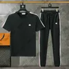 Kvinnor Tracksuits T-shirt Pants Suits 2 PCS Set Tshirts Designer Luxury Sportuits Cotton Geometry Classic Black White Striped Embroidery Badge Patchwork Jogger